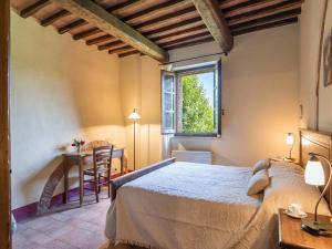 Ένα ή περισσότερα κρεβάτια σε δωμάτιο στο Agriturismo Baccoleno