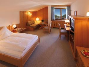 Posteľ alebo postele v izbe v ubytovaní Hotel Omesberg