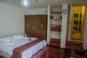 Rúm í herbergi á Inkawasi Miraflores Hostel