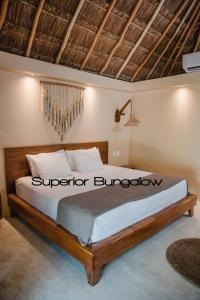 Postel nebo postele na pokoji v ubytování Hotel CasaBakal - A pie de Laguna - Bacalar