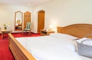 Ένα ή περισσότερα κρεβάτια σε δωμάτιο στο Hotel Stefanshof
