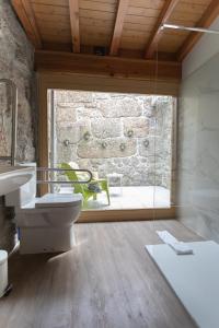 Koupelna v ubytování Bellu Suites + 37 fotografií