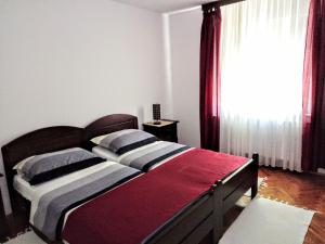 Кровать или кровати в номере Kuća za odmor Ruža, Vinkovci