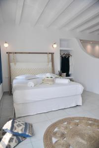 Ένα ή περισσότερα κρεβάτια σε δωμάτιο στο Blue Paradise Apartments