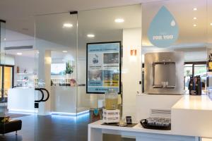 Η κουζίνα ή μικρή κουζίνα στο Hotel Santoni Freelosophy ***