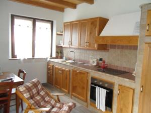 Kuchyň nebo kuchyňský kout v ubytování AGRITURISMO LA CIVITELLA