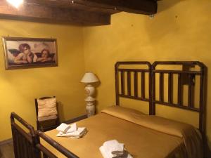 Postel nebo postele na pokoji v ubytování B&B Dhafna
