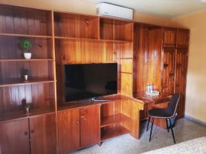 TV a/nebo společenská místnost v ubytování Portal los Castaños