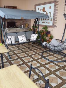 Posezení v ubytování Guest House Medea