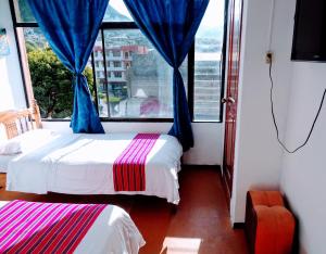 Fotografie z fotogalerie ubytování Erupcion Art Hotel & Hostel v destinaci Baños