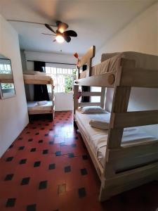 Postel nebo postele na pokoji v ubytování Noah boutique hostels Medellín