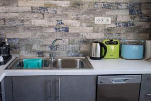 Cucina o angolo cottura di VILLA AKTI