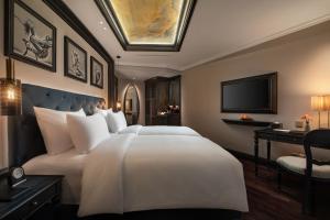 Giường trong phòng chung tại La Sinfonía del Rey Hotel & Spa