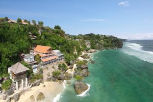 an aerial view of a resort on a beach at Impossible Cliff House in Uluwatu