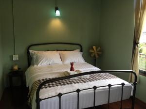 Postel nebo postele na pokoji v ubytování Talardkao Balcony Krabi