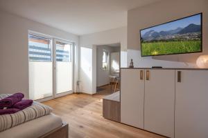 Sjónvarps- og/eða afþreyingartæki á Appartement Steidl