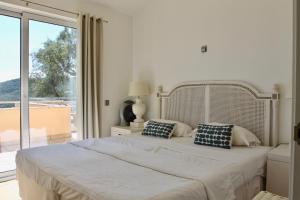 Posteľ alebo postele v izbe v ubytovaní Villa Mediterranea + 24 fotografií