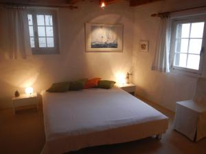Voodi või voodid majutusasutuse Guesthouse Les Mignardises toas