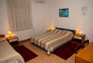 Posteľ alebo postele v izbe v ubytovaní Hotel Metković