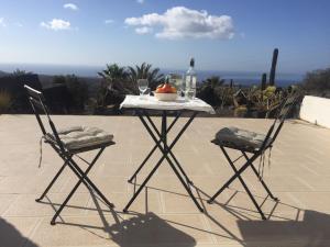 A balcony or terrace at Luxury studio, sea view, pool