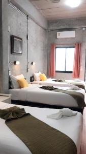 Voodi või voodid majutusasutuse White Jail at Koh Tao Hostel toas
