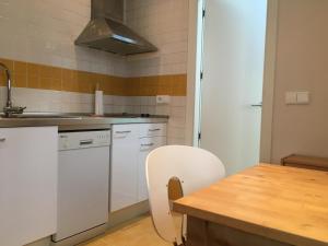 Kuchyň nebo kuchyňský kout v ubytování Vidrio Apartment
