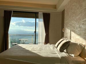 Ένα ή περισσότερα κρεβάτια σε δωμάτιο στο Two Easy Inn