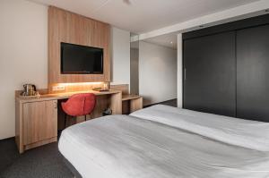 Postel nebo postele na pokoji v ubytování Hotel Iselmar
