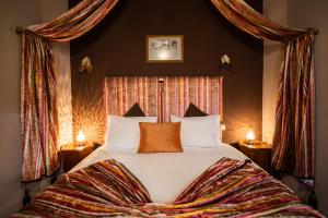 Postel nebo postele na pokoji v ubytování Riad Azcona