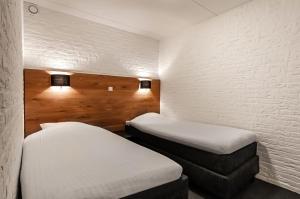 Postel nebo postele na pokoji v ubytování Hotel Iselmar