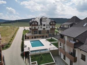 an aerial view of a house with a swimming pool at Zlatibor Hills 31 in Zlatibor