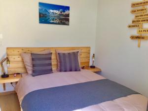 Ένα ή περισσότερα κρεβάτια σε δωμάτιο στο Gite Loudenvielle - Le 1000