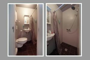 Koupelna v ubytování Hotel Zeespiegel + 37 fotografií