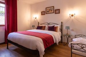 Cama ou camas em um quarto em Le Panoramic & Spa