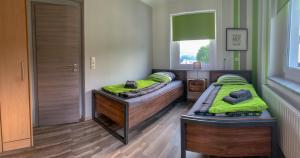 Postel nebo postele na pokoji v ubytování Ferienwohnung Herold