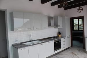 Kuchyňa alebo kuchynka v ubytovaní Palazzo del Golfo Penthouse