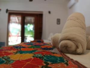 Postel nebo postele na pokoji v ubytování Casa Iguana Holbox - Beachfront Hotel