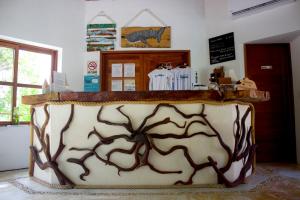 TV a/nebo společenská místnost v ubytování Casa Iguana Holbox - Beachfront Hotel