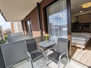 A seating area at Corvin holiday Apartments hotel Még 37 kép