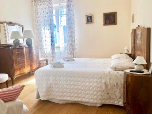 Postel nebo postele na pokoji v ubytování Casa Del Cavaliere