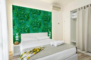 Postel nebo postele na pokoji v ubytování Hotel Albatros