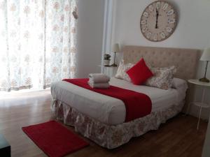 A bed or beds in a room at Casa de Huéspedes Prada