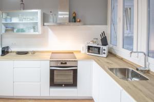 Kuchnia lub aneks kuchenny w obiekcie Apartamentos Las Musas de Cadiz