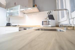 Kuchnia lub aneks kuchenny w obiekcie Apartamentos Las Musas de Cadiz
