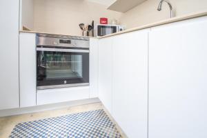 Kuchnia lub aneks kuchenny w obiekcie Apartamentos Las Musas de Cadiz