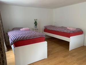 Una cama o camas en una habitación de Friendly Hostel Zürich