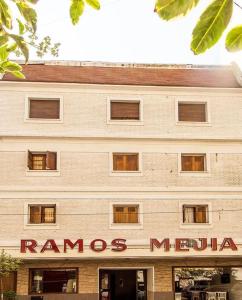 
a large building with a sign on the front of it at Hotel Ramos Mejía in Mar del Plata
