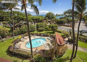 an overhead view of a swimming pool with palm trees at Maui Vista - Kihei Kai Nani Beach Condos in Kihei