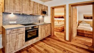 Kuchyň nebo kuchyňský kout v ubytování Appartements Rosenhof