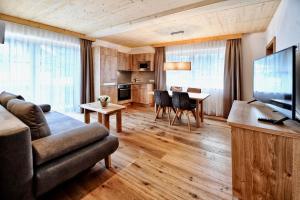 TV a/nebo společenská místnost v ubytování Appartements Rosenhof